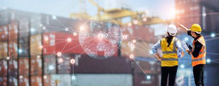 Teamwork of workers using tablet on logistic network distribution and smart transportation on networking of container cargo Industry, Import export, Online goods orders on global networking.の写真素材