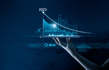Business man holding tablet with showing growth planning, opportunity, challenge and business strategy graphs and target of business gain profits in 2023, New goal, Plan and visions for next year.の写真素材