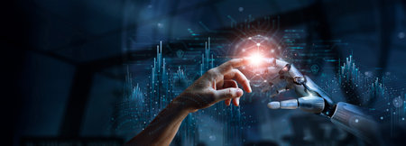AI, Machine learning, Hands of robot and human touching on big data network connection, Data exchange, deep learning, Science and artificial intelligence technology, innovation of futuristic.の写真素材