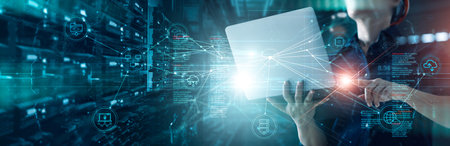 Chief Engineer connecting data center on global networking in mainframe of server room of storage systems and connect of data on internet network business. innovation of futuristic.の写真素材