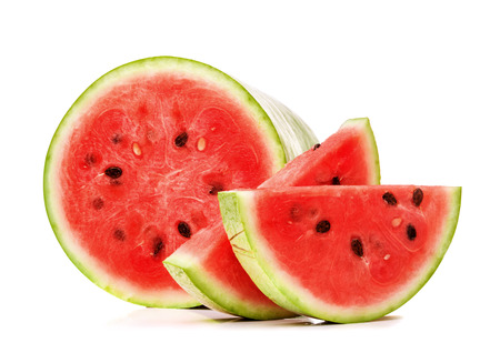 long watermelon and sliced pieces isolated on a white background closeupの写真素材