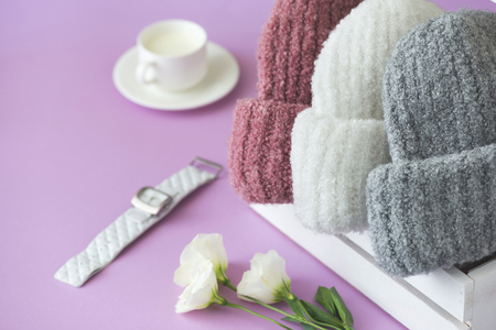Knitted white and gray hatsの写真素材