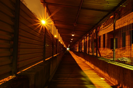 Construction site protected area used for placement of the building object construction, temporary buildings and structures, machinery, piles of soil, products, equipment.の写真素材