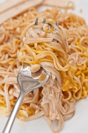 macaroni with mushroom and forkの写真素材