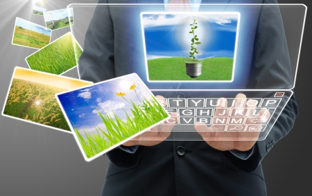 businessman typing the keyboard with natural picturesの写真素材