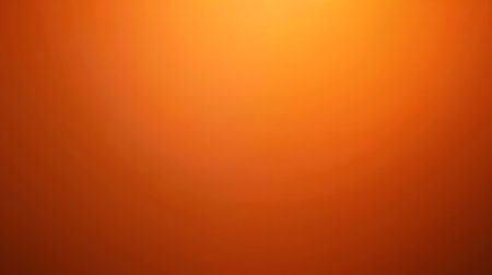 A warm gradient of orange hues, evoking feelings of warmth and tranquility.の素材