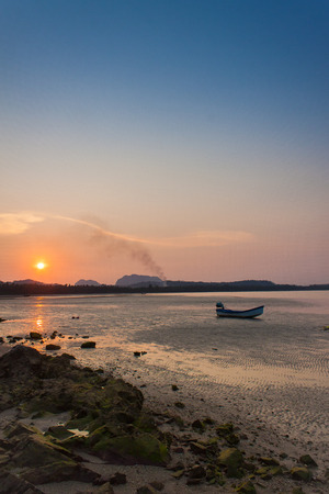 &#3642;Boat in evening sunsetの写真素材