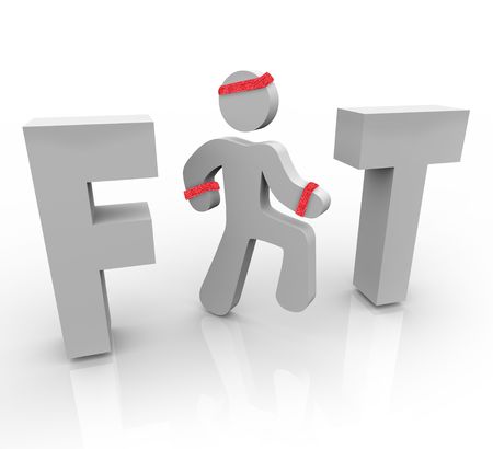 A jogging man stands in for the I in the word Fitの写真素材