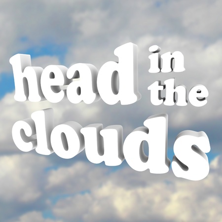 The words Head in the Clouds in 3D letters against a cloudy sky, representing someone who is mad,...