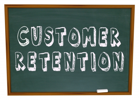The words Customer Retention on a chalkboard for a lesson or training in keeping customers for your businessの写真素材
