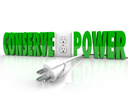 Conserve Power words and electrical plug taken out of energy outlet to practice green conservation...