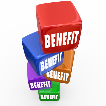 Benefit word on blocks or cubes to illustrate advantages or incentives of a job or opportunityの写真素材