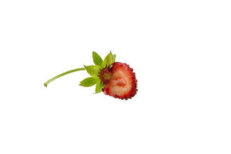 half of the strawberries on a white backgroundの写真素材