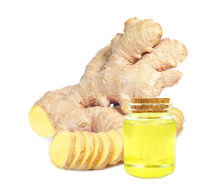 ginger oil in a bottle isolated on a white background