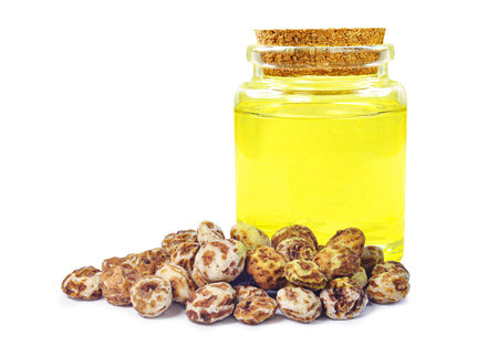 white sesame oil in bottle isolated on white backgroundの写真素材