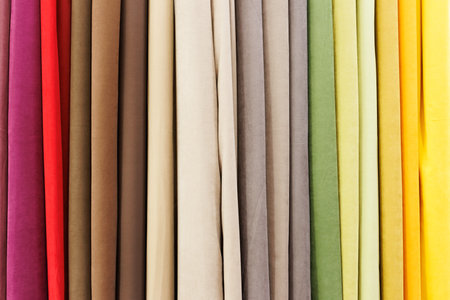 Colorful fabric samples as a background, close-up view.の写真素材