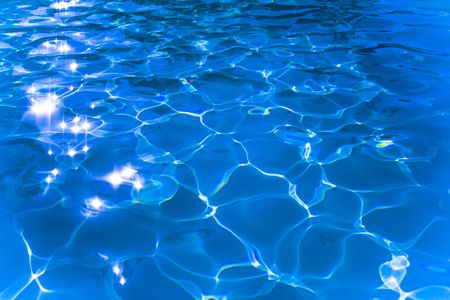 dancing sunlight on the clean and clear waterの写真素材