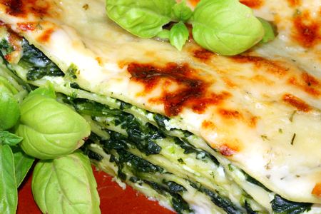 Vegetarian lasagna with ricotta cheese spinach filling and basil の写真素材