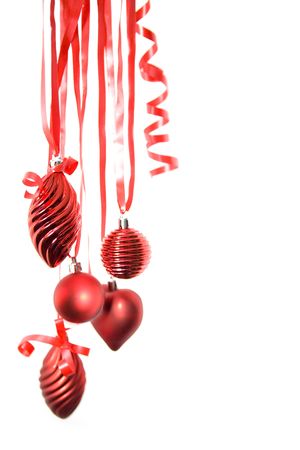 Red christmas decorates isolated over white backgroundの写真素材