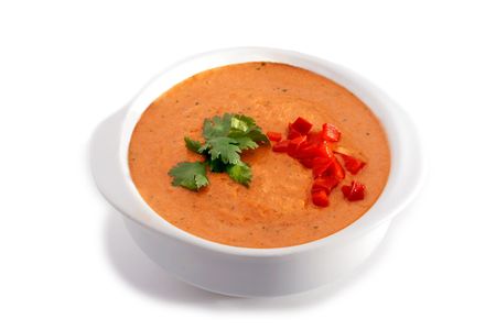 White bowl of gaspacho soup on white backgroundの写真素材