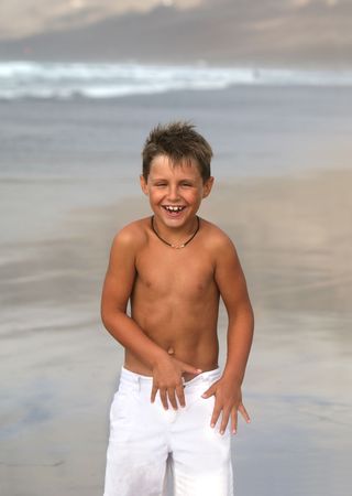 smiling boy in the towelの写真素材