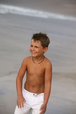 Happy boy on the beachの写真素材