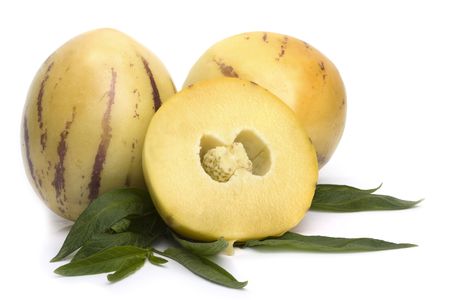 Pepino fruit with leavs isolated on white の写真素材