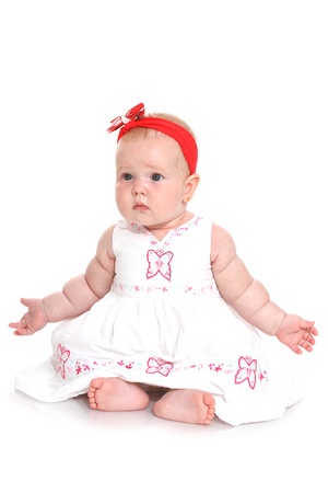 little child baby girl sittingの写真素材