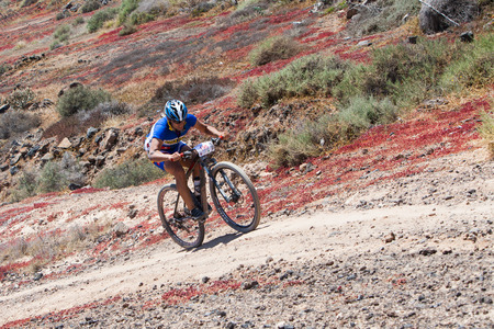 LANZAROTE, SPAIN - MAY 03: SERGIO RUIZ N195 in action at Adventure mountain bike marathon "Ultrabike Santa Rosa" May 03, 2015. Lanzarote, Canaries islands, Spain.のeditorial素材