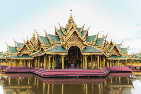 Golden temple with stair to poolの写真素材