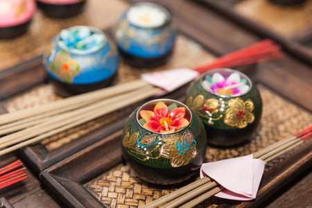 Lotus candle and joss stick for prayingの写真素材