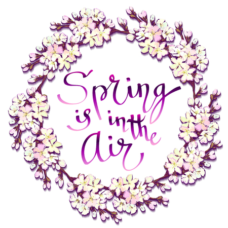 Spring calligraphy card. Hand drawn sakura wreath. Circle frame, blossom cherry branches. Calligraphy quote spring is in the air. Hand drawn lettering quote, cherry border on white background isolatedのイラスト素材