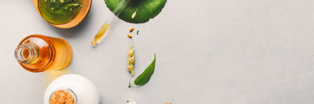 Natural cosmetics, oils for skin care on a light background. Homeopathic oils, whey, milk, soap. Beauty blogger concept.の写真素材