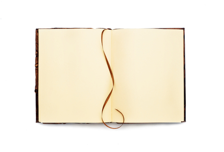 Open book with yellow pages and bookmark. Isolated. Vintage Top view.の写真素材