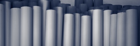 Metal pipes, stand upright. Concept backgrounds of metal industry. Bannerの写真素材