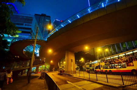 HONG KONG, CHINA - APRIL 29, 2014: Hong Kongs nightlife center. View of the flyover and skyscrapersのeditorial素材