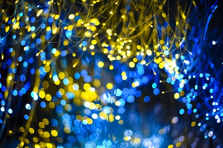 Abstract background with fantasy bokeh texture purple neon and golden color.