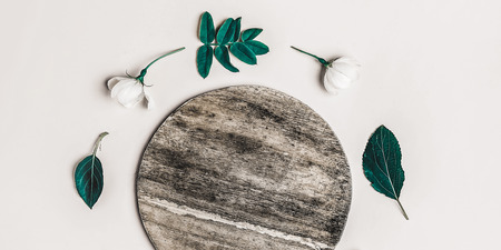 Creative layout of white flowers and plants with copy space for writing. Banner