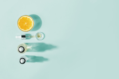 Serum with vitamin C, concept design. Beauty therapy, body care. Minimalism Flat lay.の写真素材