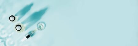 Hyaluronic acid, botulin, serum in vials. Concept of cosmetic surgery for facial rejuvenation.