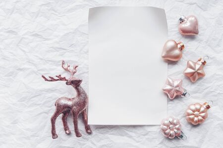 Composition with Cerulean deer and Christmas decorations in pastel colors. Flat lay, minimalism.の写真素材