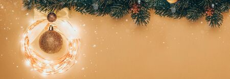 Christmas and New Year holiday background. Xmas greeting card. Golden Christmas decoration. Noel. Top view. Flat lay.の写真素材