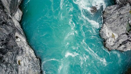 Mountain turquoise river, rocky banks aerial view. Drone shooting. Katun River, Altai.の写真素材