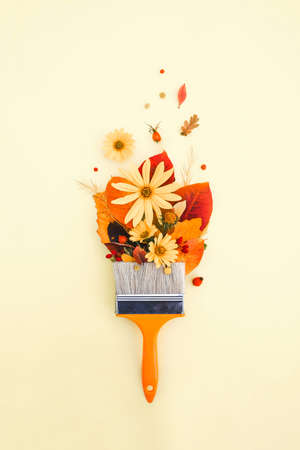 Brush paint with colorful autumn leaves, creative concept of autumn and leaf fallの写真素材