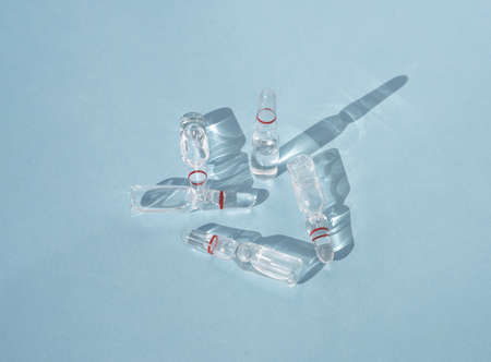 Glass ampoules with medicinal product, vaccine for medical and cosmetic injections Composition from ampoules with shadowsの写真素材
