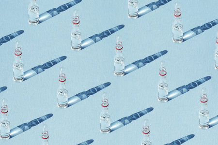 Pattern from Glass ampoules with a drug, vaccine for medical and cosmetic injectionsの写真素材