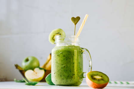 Vegan drink, detox diet smoothie of green fruits, vegetablesの写真素材
