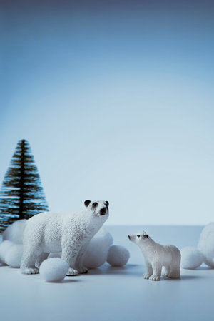 Abstract minimal winter background, polar bears in winter forestの写真素材