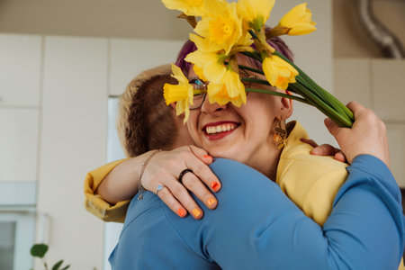Family affection: Birthday greetings from daughter for mom with flowers