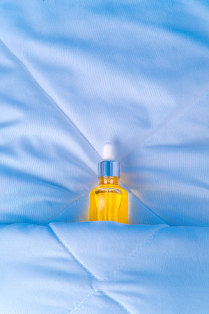 Cosmetics, Serum, Oil For Skin Care In Bedroom Night Time. An anti-aging treatment for a refreshed awakening experience. Hyaluronic acid for fresh morning skin.の写真素材